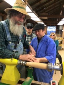 Photo of George Wurtzel Teaching Woodworking at Enchanted Hills Camp