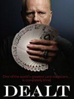 Image of Richard Turner holding a fanned out deck of cards.