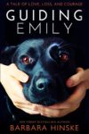 Photo of the Guiding Emily book with a impression of Garth the Guide dog.